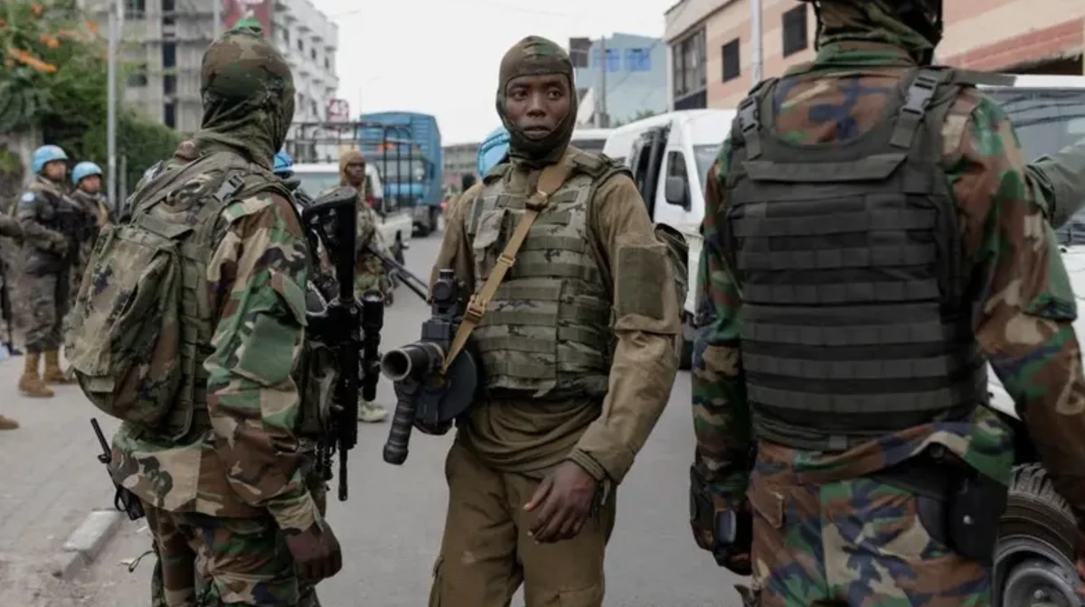 Members of the M23 rebel group supervise the exit of mercenary troops in the streets of Goma amid conflict between them and the Armed Forces of the Democratic Republic of the Congo (FARDC). (Reuters/File Photo)