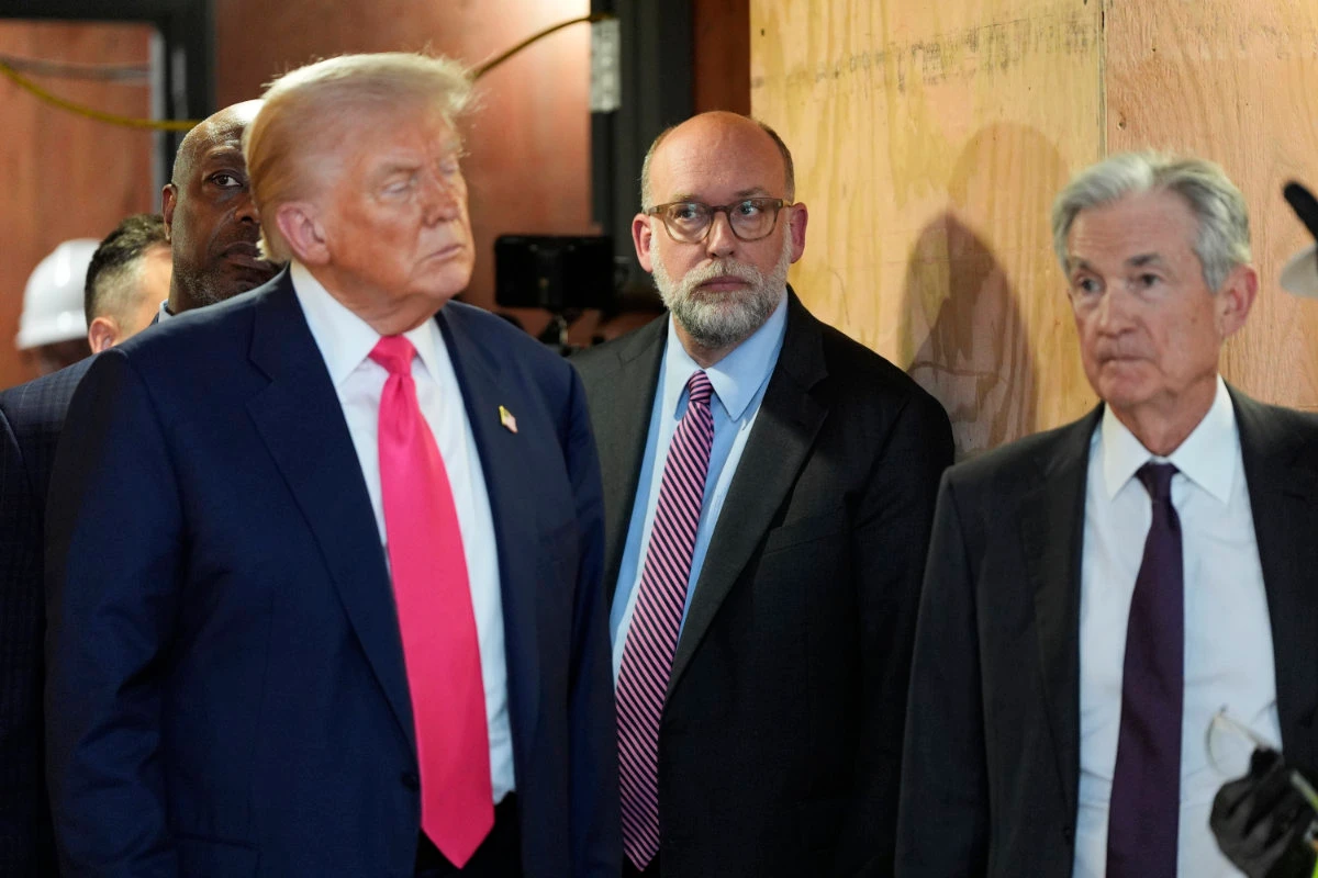 President Donald Trump (left), with Office of Management and Budget chief Russell Vought (center) and Federal Reserve Chairman Jerome Powell, visit the Federal Reserve in Washington on July 24, 2025. (AP)
