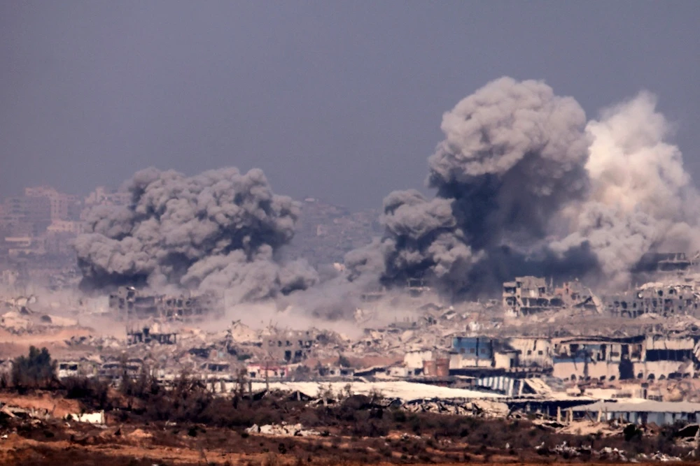 Thick smoke billowing during Israeli strikes on the besieged Palestinian territory on July 27, 2025. (AFP)