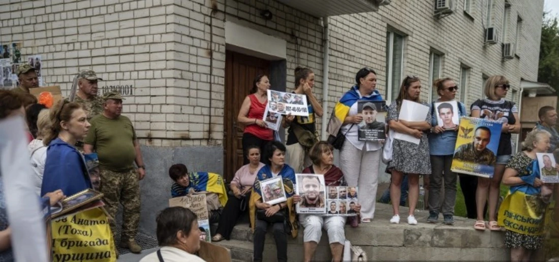 Relatives and loved ones of Ukrainian military personnel of the Armed Forces wait for them to return after the prisoner swap deal in Chernihiv region of Ukraine. (AFP)