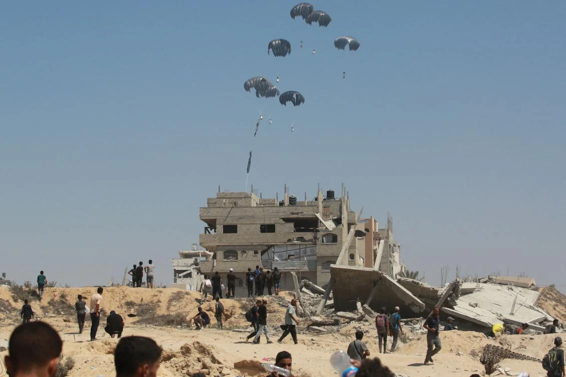 Israel says Gaza got 120 trucks of aid on day one of pause