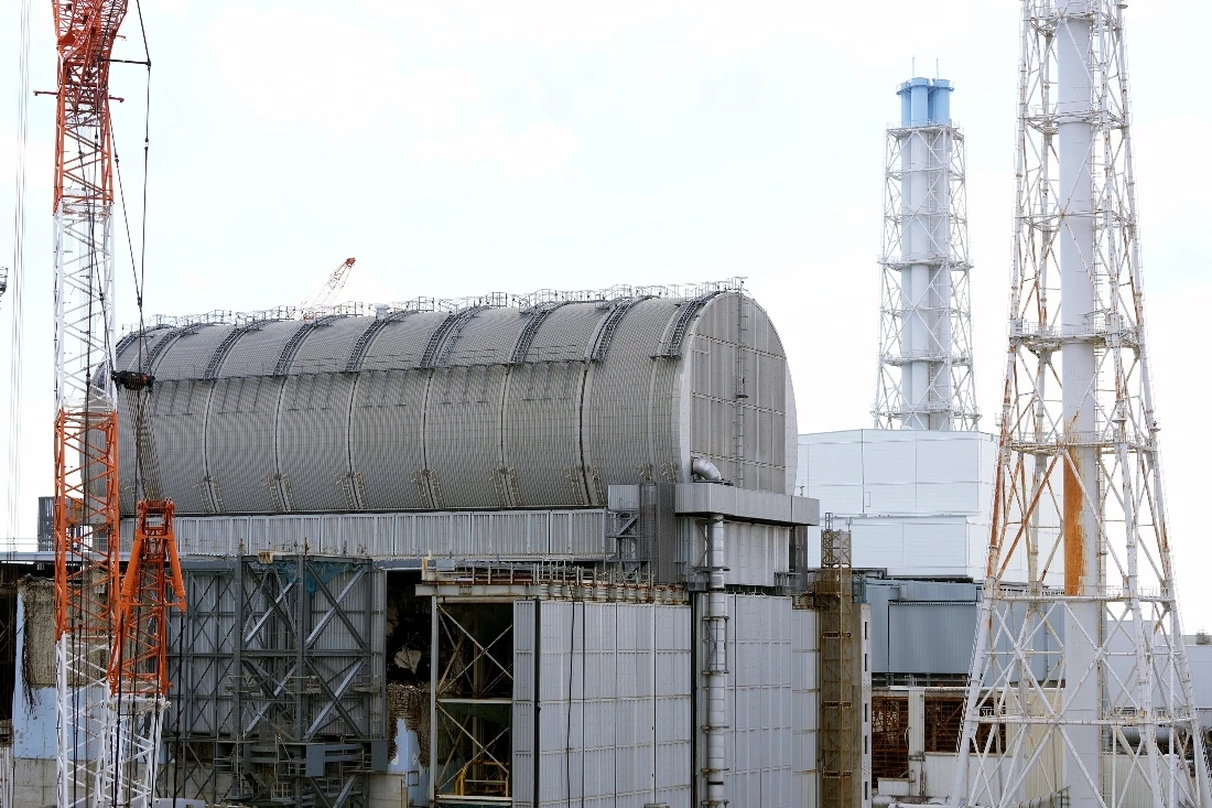 The Unit 3 reactor covered with protective housing at the Fukushima Daiichi nuclear power plant in Okuma town, Japan. (AP)