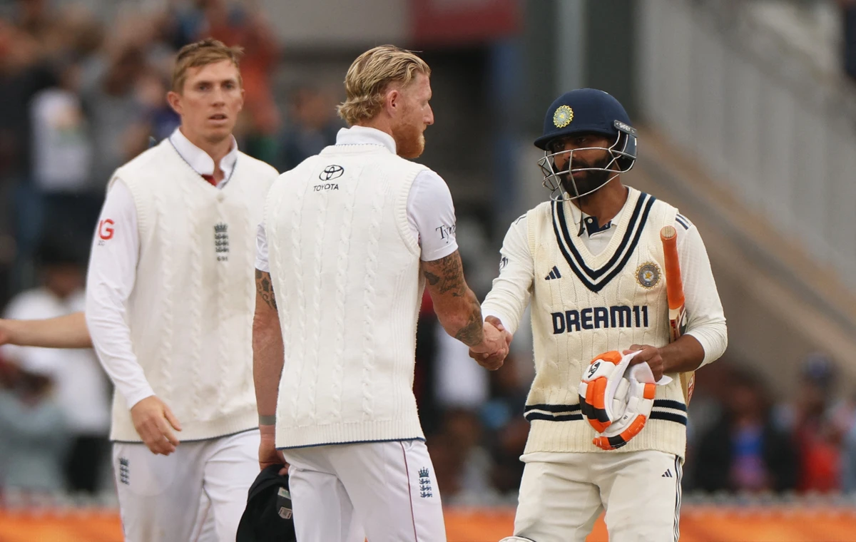 England’s Ben Stokes shakes hands with India’s Ravindra Jadeja after the fourth cricket Test match between England and India is drawn at the Old Trafford Cricket Ground Sunday. (Action Images via Reuters)