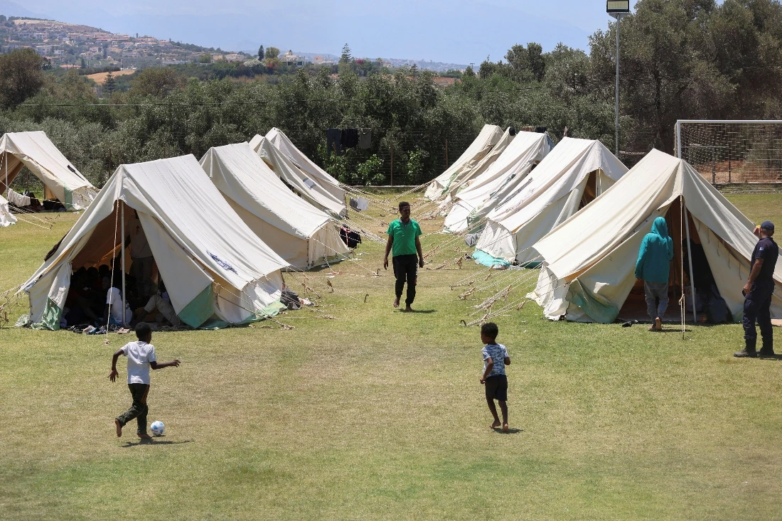 Children play at the temporary migrants camp in the region of Rethymno in Crete island, Greece. (Reuters)