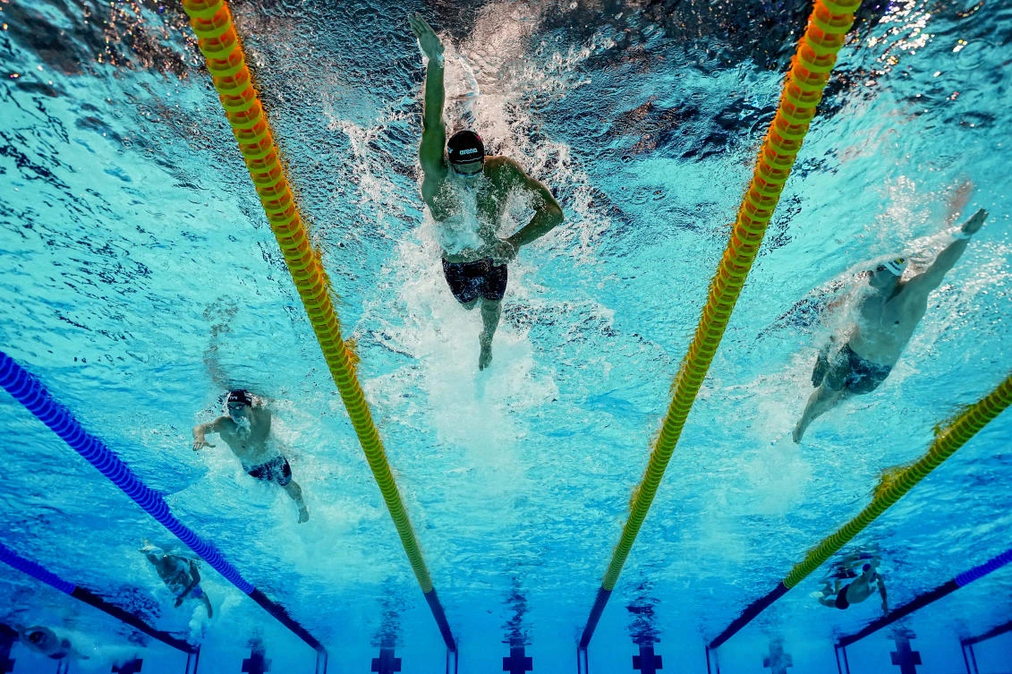 Tunisia’s Ahmed Jaouadi won his first major title with victory in the 800m freestyle at swimming’s world championships on Wednesday with a perfectly timed attack. (REUTERS)