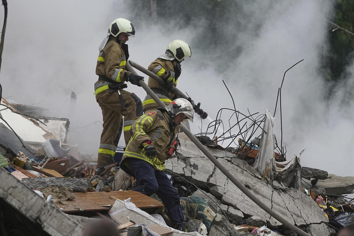Rescuers work in a destroyed apartment building after a Russian missile attack in Kyiv on July 31, 2025. (AP)