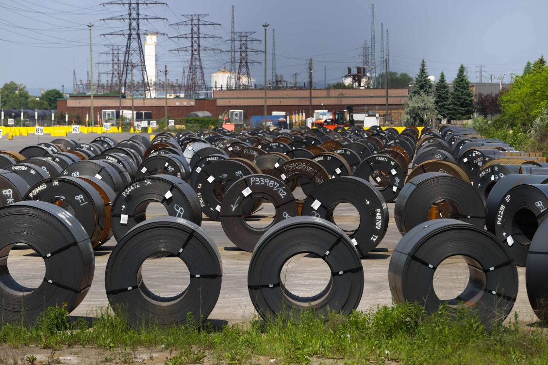 Coils of steel are seen in a yard outside one of ArcelorMittal Dofasco’s steel manufacturing buildings in Hamilton, Ontario. Canada’s lumber, steel, aluminum and automobiles sectors are more those heavily impacted by US duties and tariffs. (AFP)