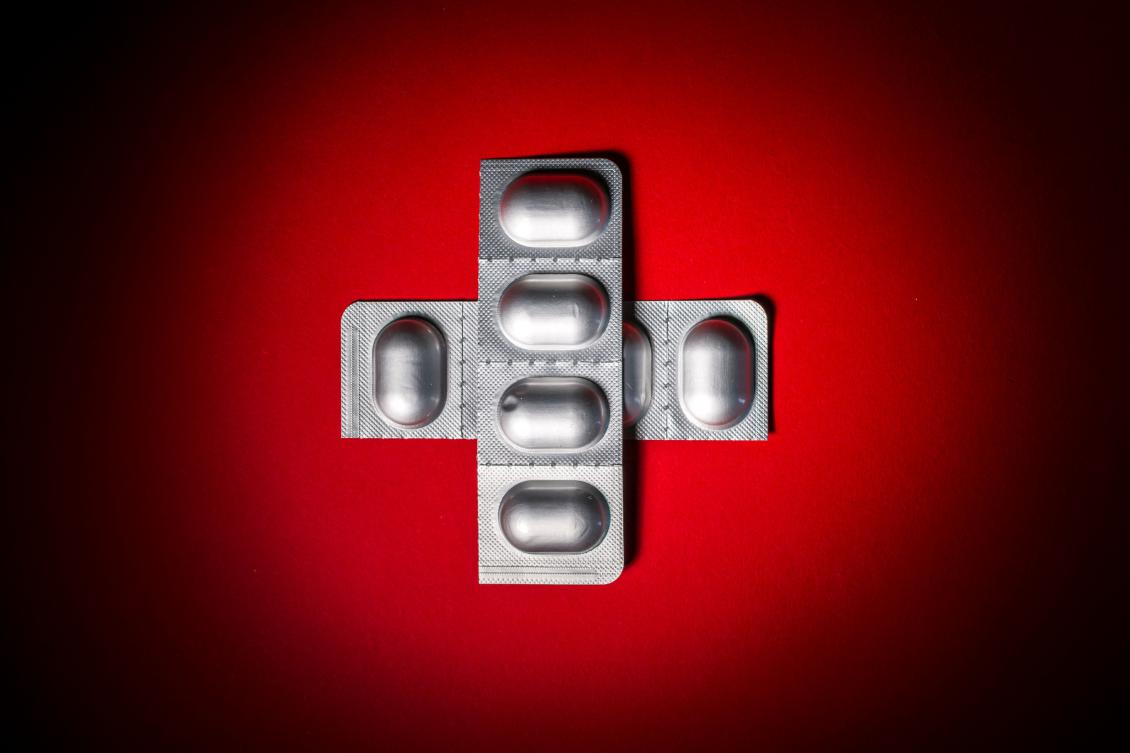 This photograph shows blister packs of Swiss medications by Sandoz, shaping a Swiss cross, in Lausanne on August 1, 2025 as Washington said it planned to charge a 39 percent tariff rate on Swiss goods. (AFP)