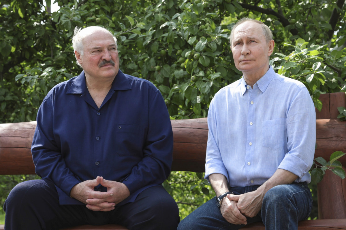 Russian President Vladimir Putin, right, and Belarusian President Alexander Lukashenko talk during their visit to the Smolensky Skete of Valaam Monastery at Valaam island in Ladoga lake, Karelia, Russia, on Aug. 1, 2025. (Sputnik, Kremlin Pool Photo via AP)