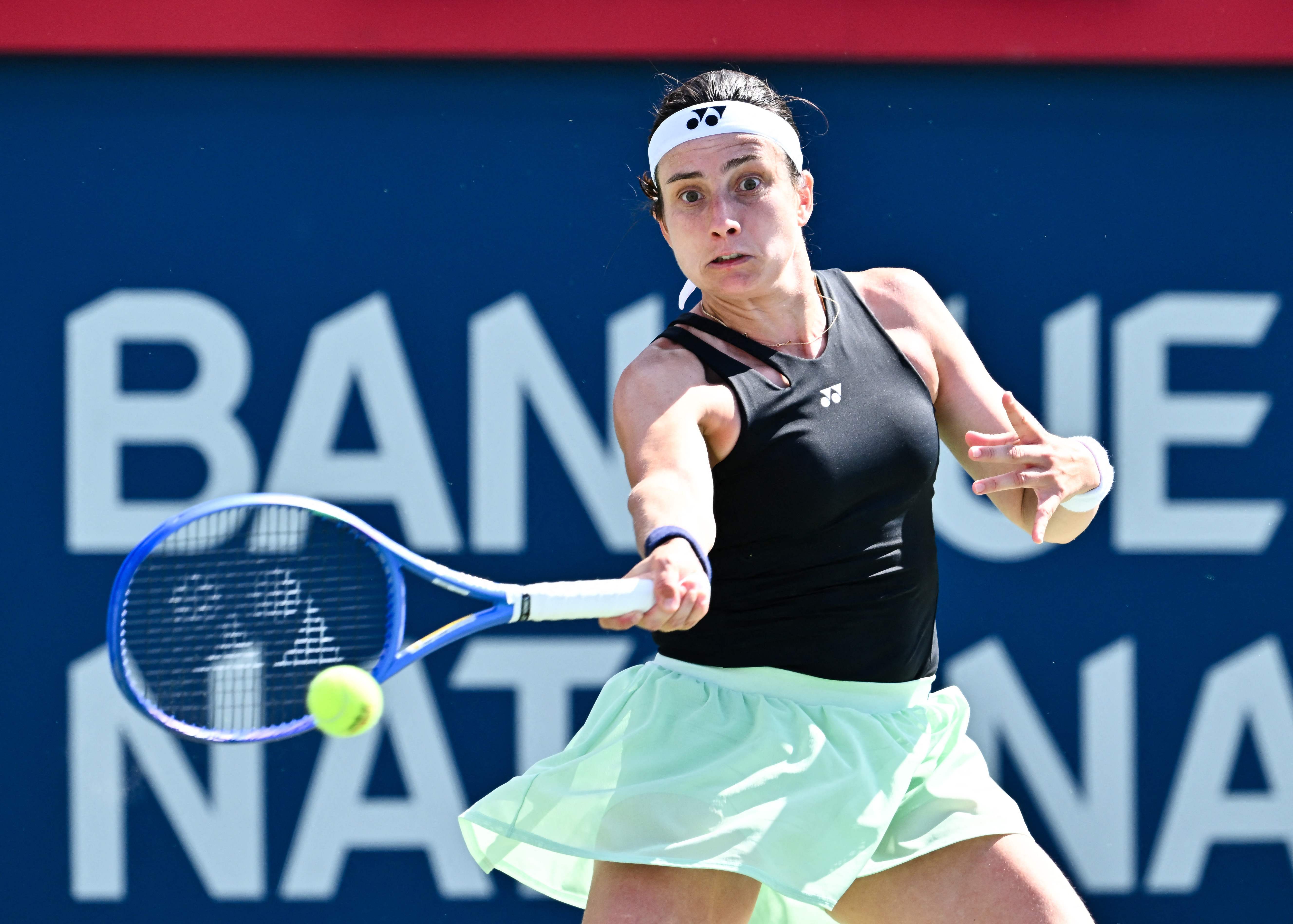 Anastasija Sevastova of Latvia plays a forehand against Jessica Pegula of the US during their third round of the WTA 1000 National Bank Open at IGA Stadium on Friday in Montreal, Quebec, Canada. (Getty Images via AFP)