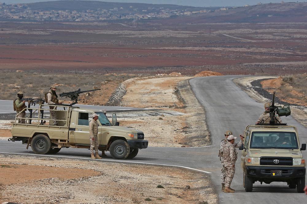 Above, Jordanian soldiers patrol along the border with Syria. Jordan’s armed forces often report foiling border infiltration attempts, sometimes for drug smuggling. (AFP file photo)