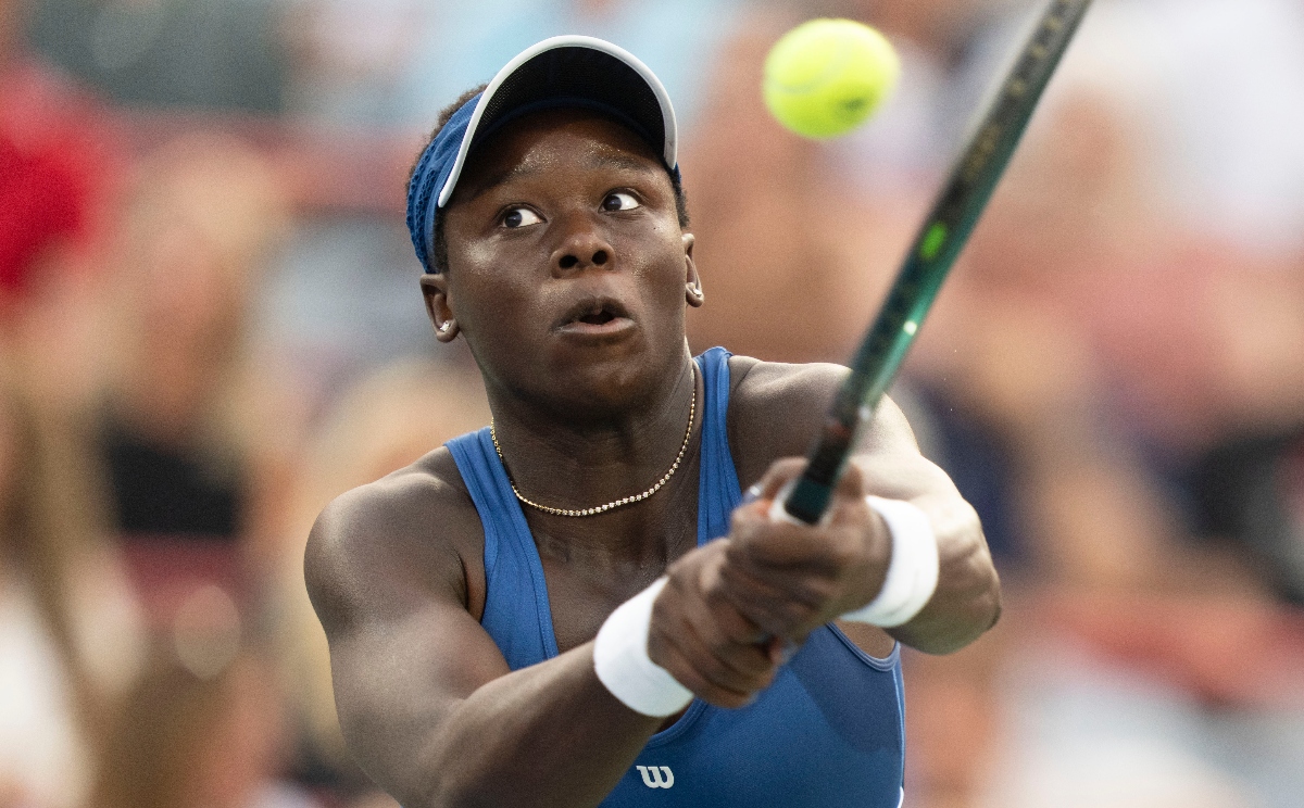 Victoria Mboko, of Canada, hits a return to Coco Gauff, of the US, during round of 16 action at the National Bank Open women’s tennis tournament in Montreal Saturday. (The Canadian Press via AP)