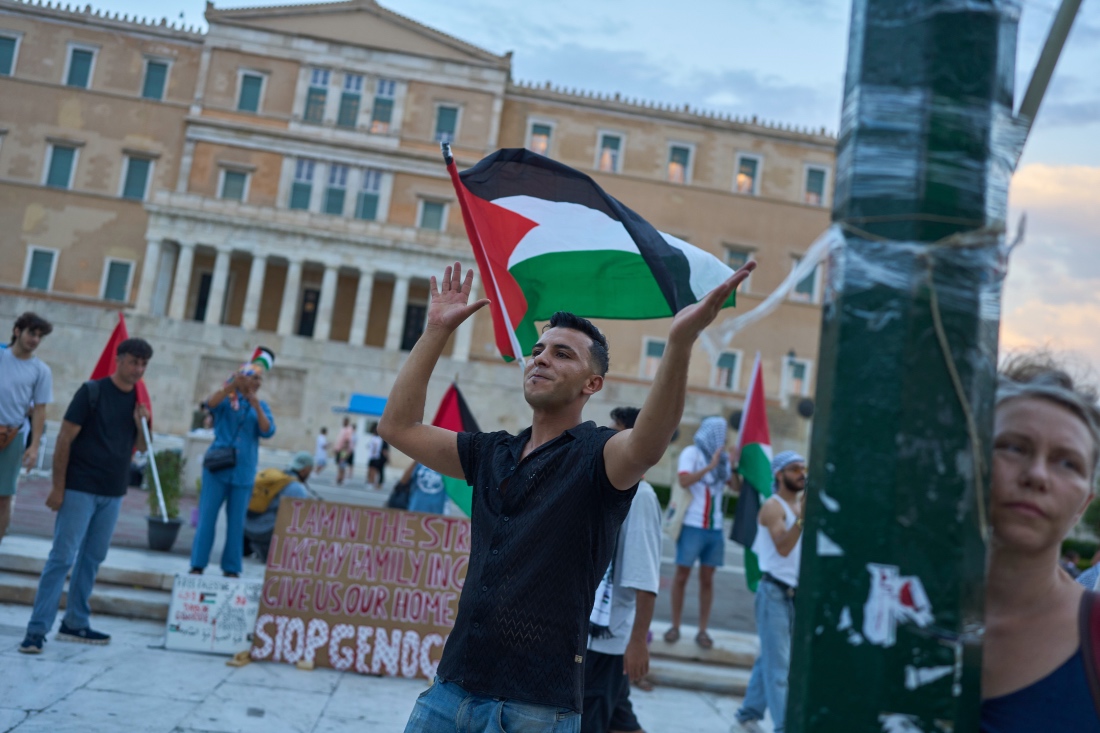 Protestors gather outside Greece's Parliament in central Athens gainst the war in the Gaza Strip, and Israel's measures regarding food distribution. (AP)