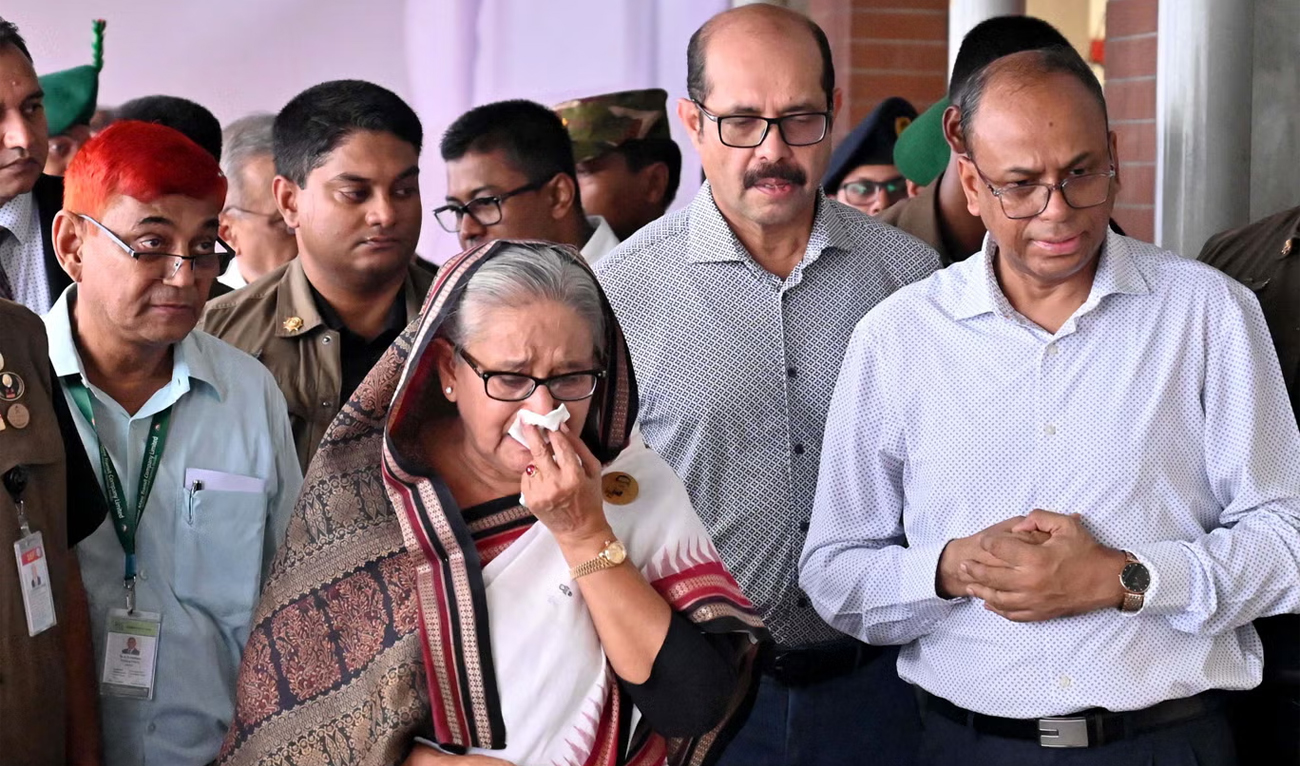 Former Prime Minister Sheikh Hasina weeps while she visits a metro station, vandalized by students during the anti-quota protests, in Mirpur, Bangladesh, on 25 July 2024. (Bangladesh Prime Minister’s Office/File)