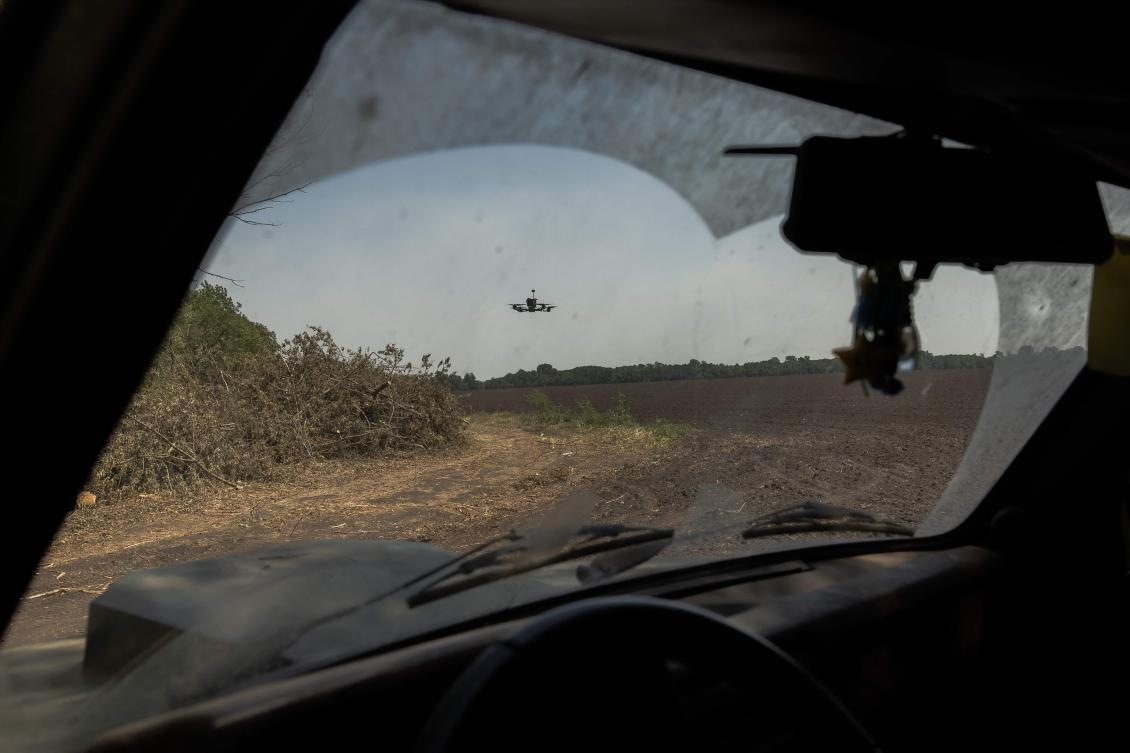 An FPV drone operated by a Ukrainian serviceman of the Black Arrow battalion flies during a test flight before a combat mission, in the Dnipropetrovsk region (AFP)