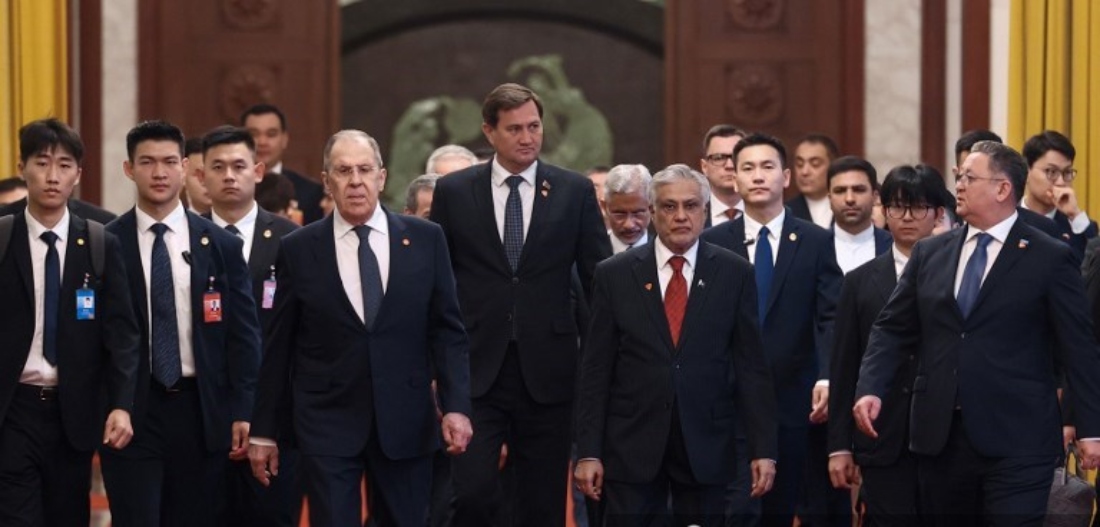 Russian Foreign Minister Sergey Lavrov walks with SCO foreign ministers to attend a meeting in Beijing, China. (Handout Russian Foreign Ministry)
