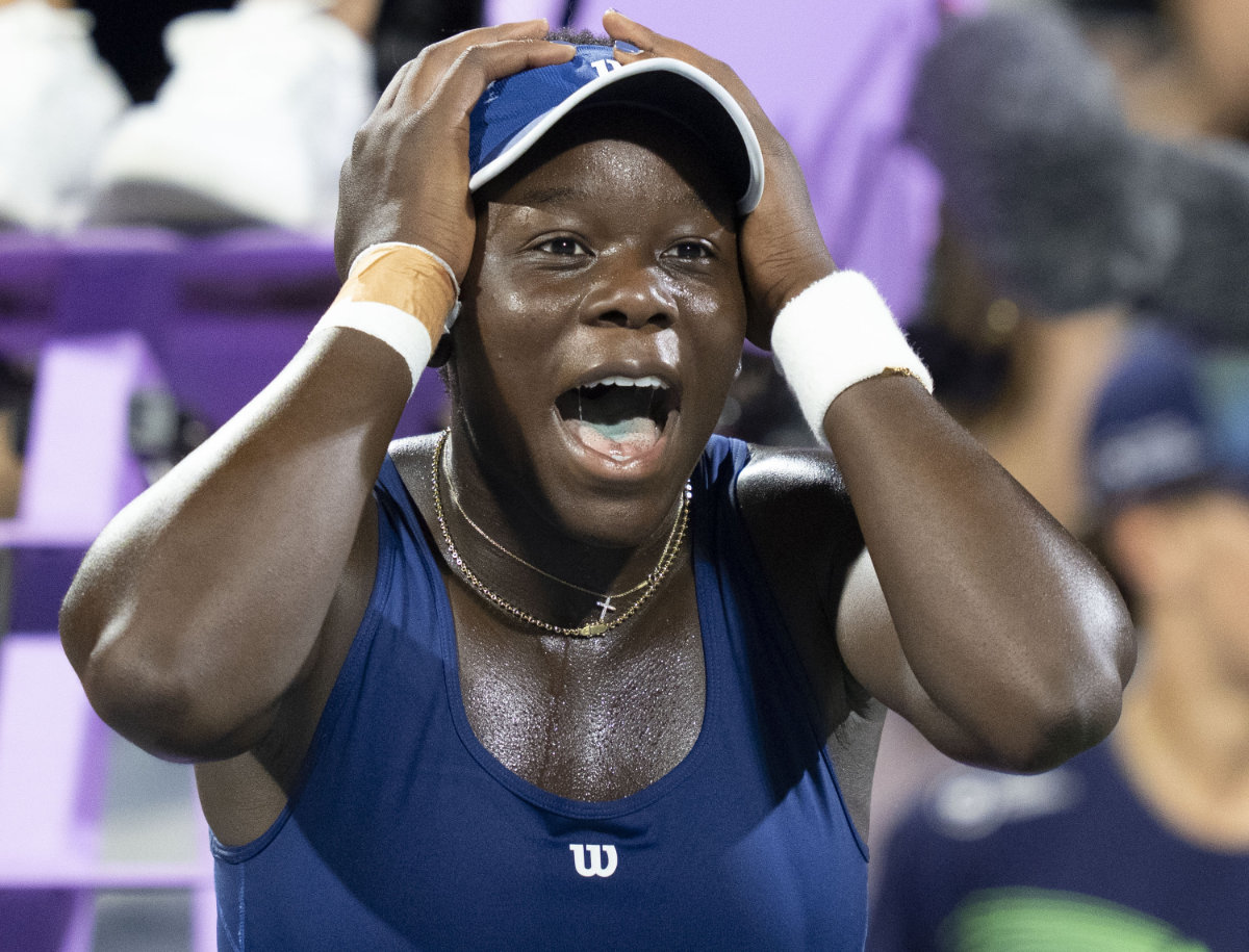 Victoria Mboko of Canada reacts following her win over Elena Rybakina of Kazakhstan during semifinal tennis action at the National Bank Open in Montreal on Aug. 6, 2025. (The Canadian Press via AP)