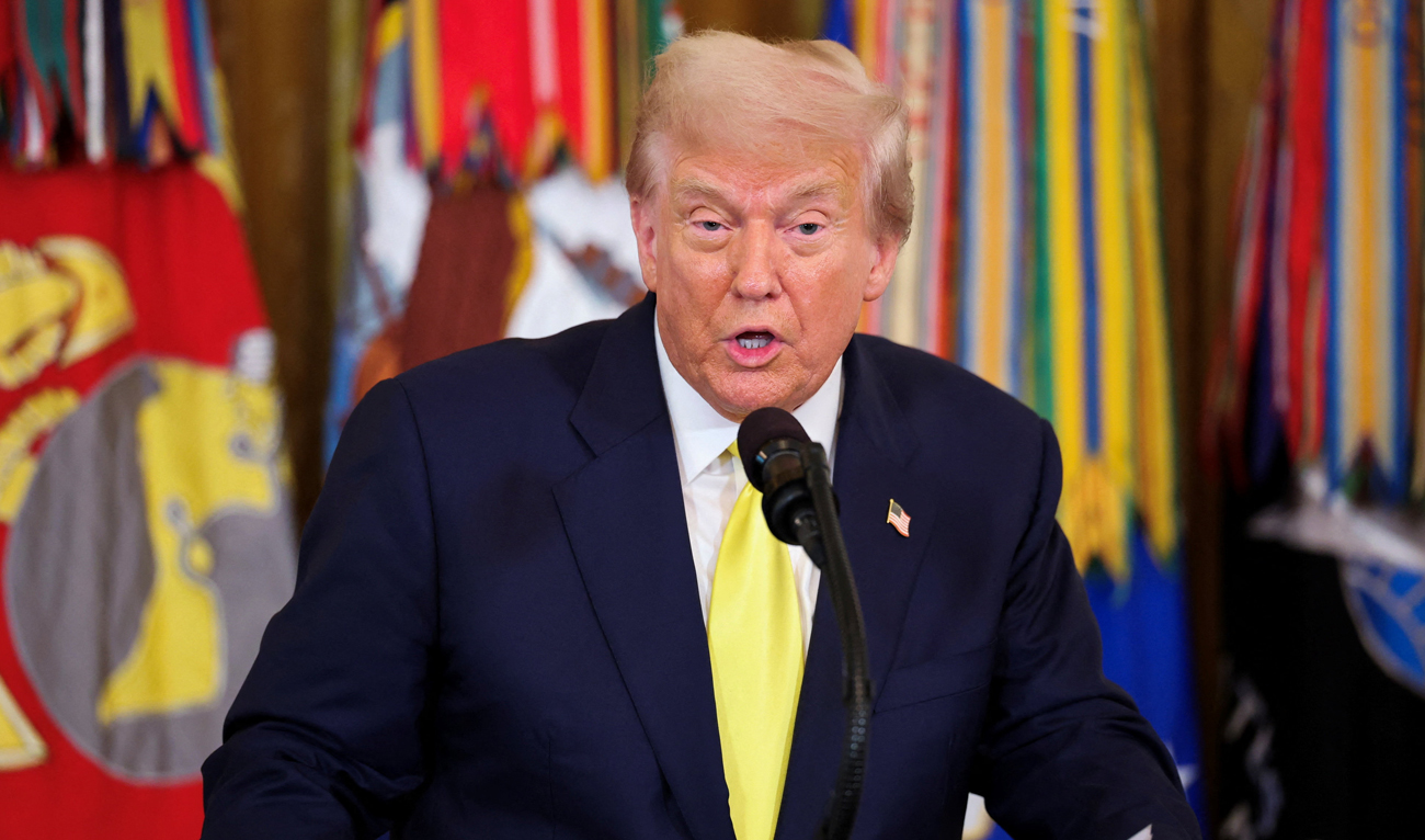 US President Donald Trump speaks at a Purple Heart Day event to honor members of the military wounded or killed in action, in the East Room of the White House in Washington, D.C., US on August 7, 2025. (REUTERS)