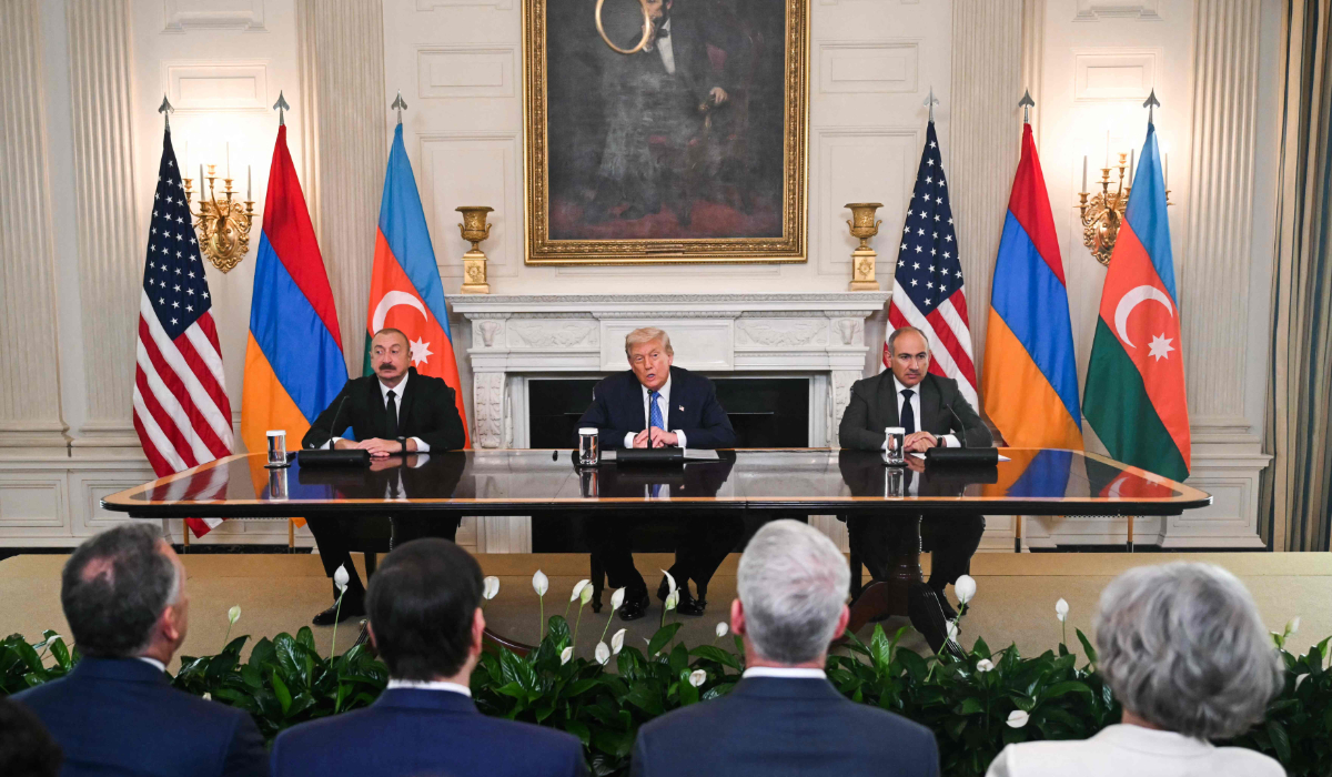 US President Donald Trump participates in a trilateral signing with Azerbaijani President Ilham Aliyev (L) and Armenian Prime Minister Nikol Pashinyan (R) in the State Dining Room of the White House in Washington, DC on August 8, 2025. (AFP)