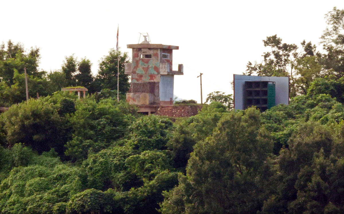 A North Korean military guard post, left, and loudspeaker are seen from Paju near the border with North Korea on Aug. 9, 2025. (Yonhap via AP)