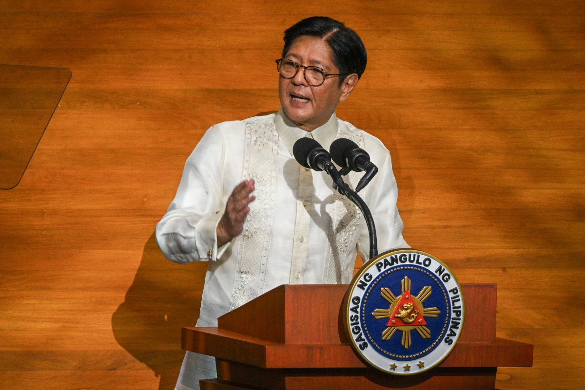 Philippine President Ferdinand Marcos delivers his speech during the State of the Nation Address at the House of Representatives in Manila on July 28. (AFP)