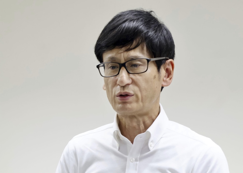 Tsuyoshi Yasukochi, executive secretary of the Japan Boxing Commission, speaks at a press conference on Sunday, Aug. 10, 2025 in Tokyo, after the deaths of two fighters who competed in bouts on Aug. 2, 2025. (Kyodo News via AP)