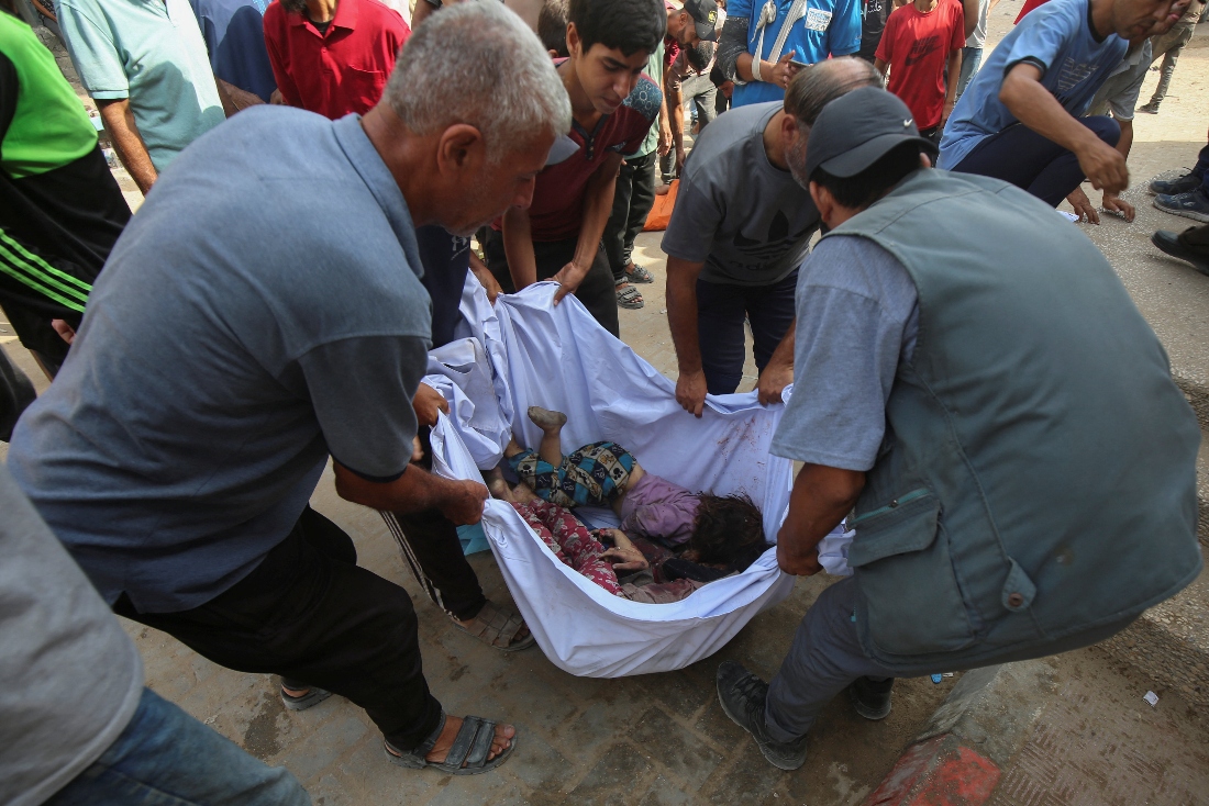 Mourners carry the bodies of Palestinian children from Irheem family, who were killed in an overnight Israeli strike in Gaza City. (Reuters)