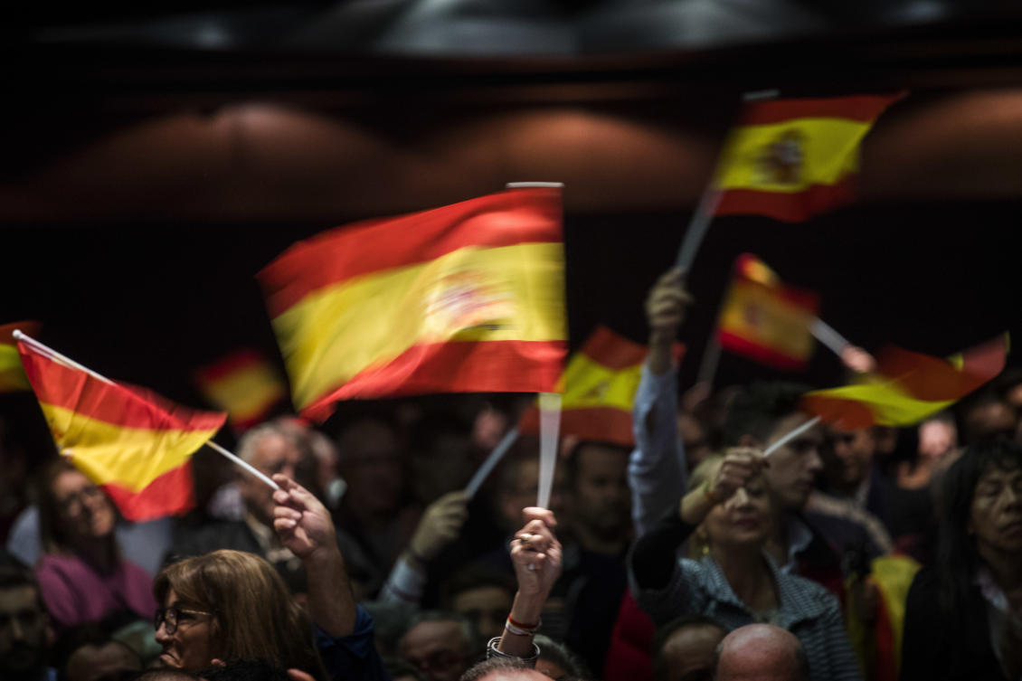 Supporters of Spain's far-right Vox party wave flags during a rally in Murcia, Spain, Wednesday Nov. 14, 2018. (FILE/AP)