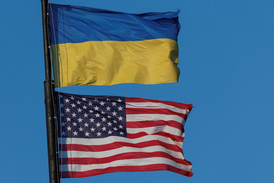 National flags of Ukraine and the United States wave over a building of American University in Kyiv, Ukraine. (Reuters)