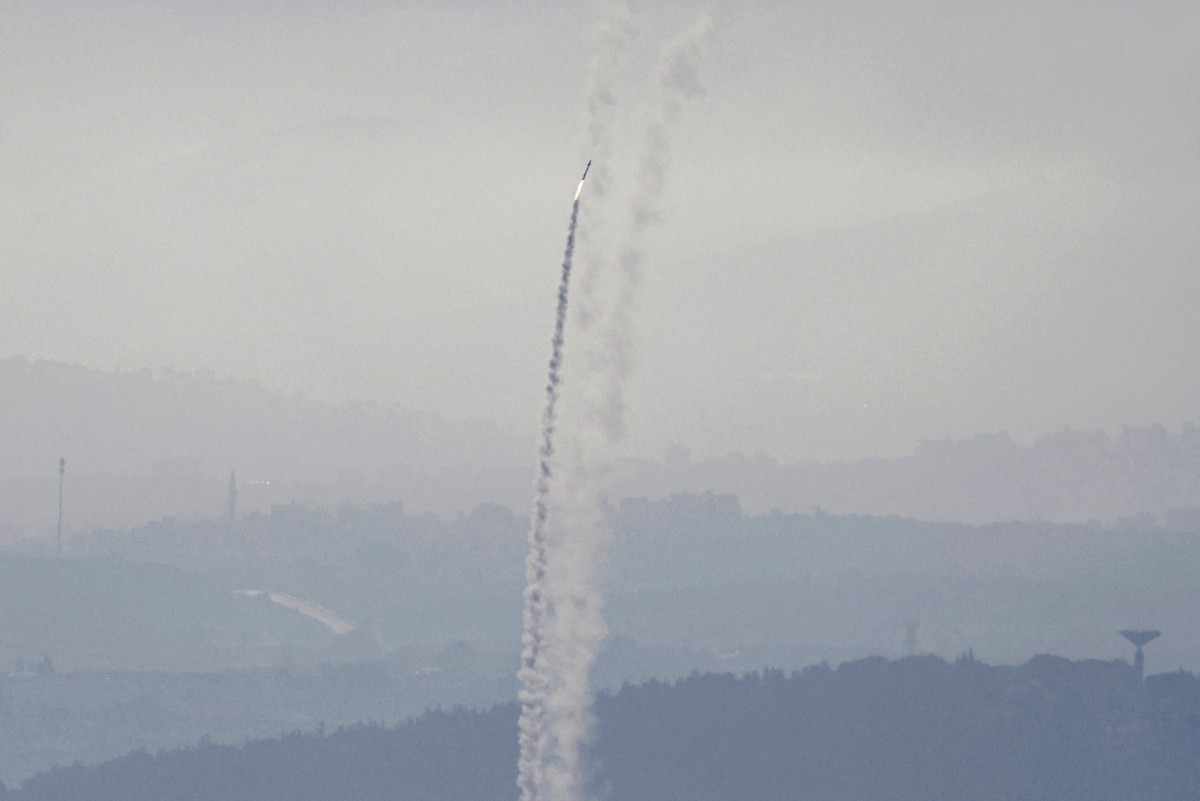 Israeli air defence systems are activated to intercept Iranian missiles over Haifa. (File/AFP)