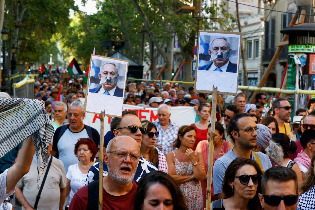 pro-Palestinian demonstrators march to show their solidarity with Palestinians in Gaza and to protest against Israel, in Barcelona, Spain. (Reuters)
