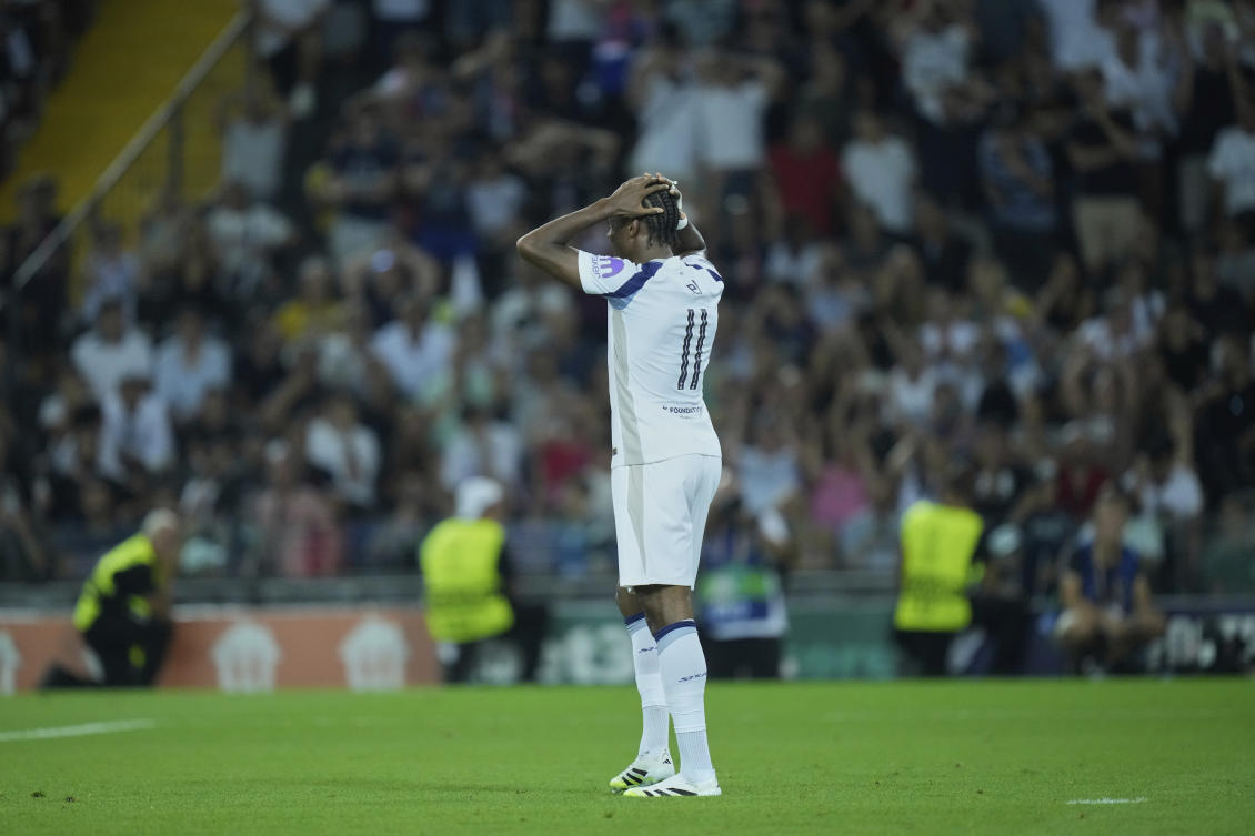 Tottenham's Mathys Tel reacts during the penalty shootout the UEFA Super Cup soccer match between Paris Saint-Germain and Tottenham Hotspur in Udine, Italy, Wednesday, Aug. 13, 2025. (AP Photo/Darko Bandic)