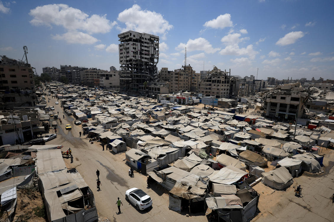 Palestinians, displaced by the Israeli offensive, shelter in a tent camp as the Israeli military prepares to relocate residents to southern Gaza, in Gaza City August 17, 2025. (Reuters)