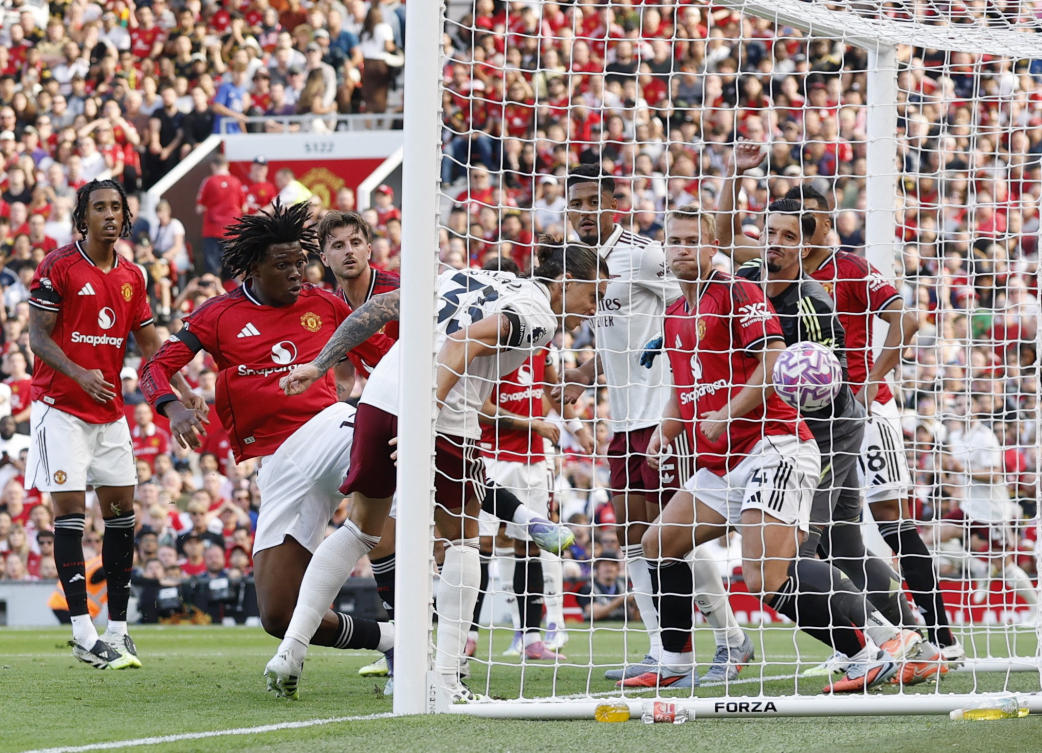 Arsenal’s Riccardo Calafiori scores their winning goal against Manchester United at Old Trafford on the opening weekend of Premier League action. (Action Images via Reuters)