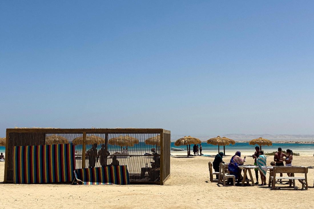 People gather at the Ras Hankorab beach in the Red Sea Wadi Al Gemal protectorate in southern Egypt. (AFP)