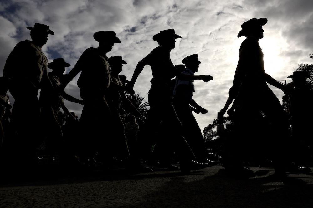 New Zealand servicemen march on ANZAC Day in Melbourne on April 25, 2024. A military court found a New Zealand soldier guilty of attempted espionage for a foreign power on Monday. (AFP file photo)