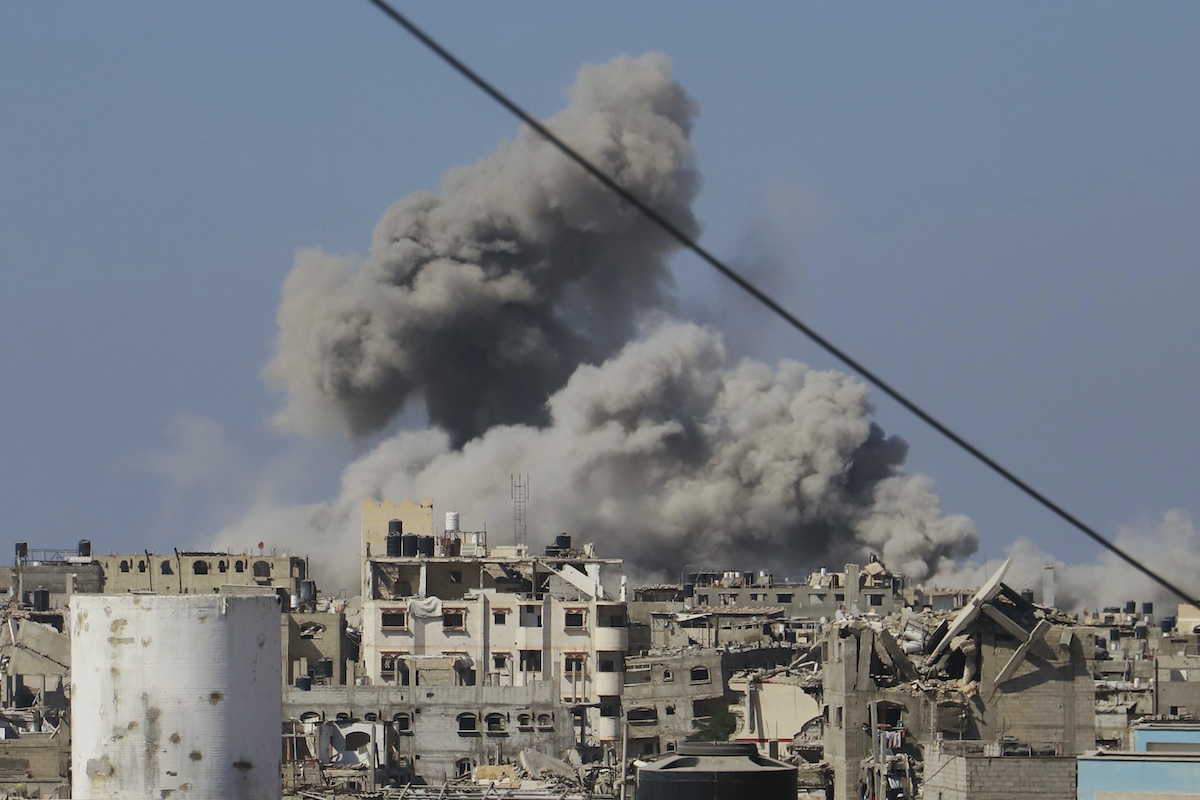 An Israeli airstrike on Khan Younis in Gaza on Monday. A group of UK politicians has called on the UK government to sanction Israel over the war. (AP)