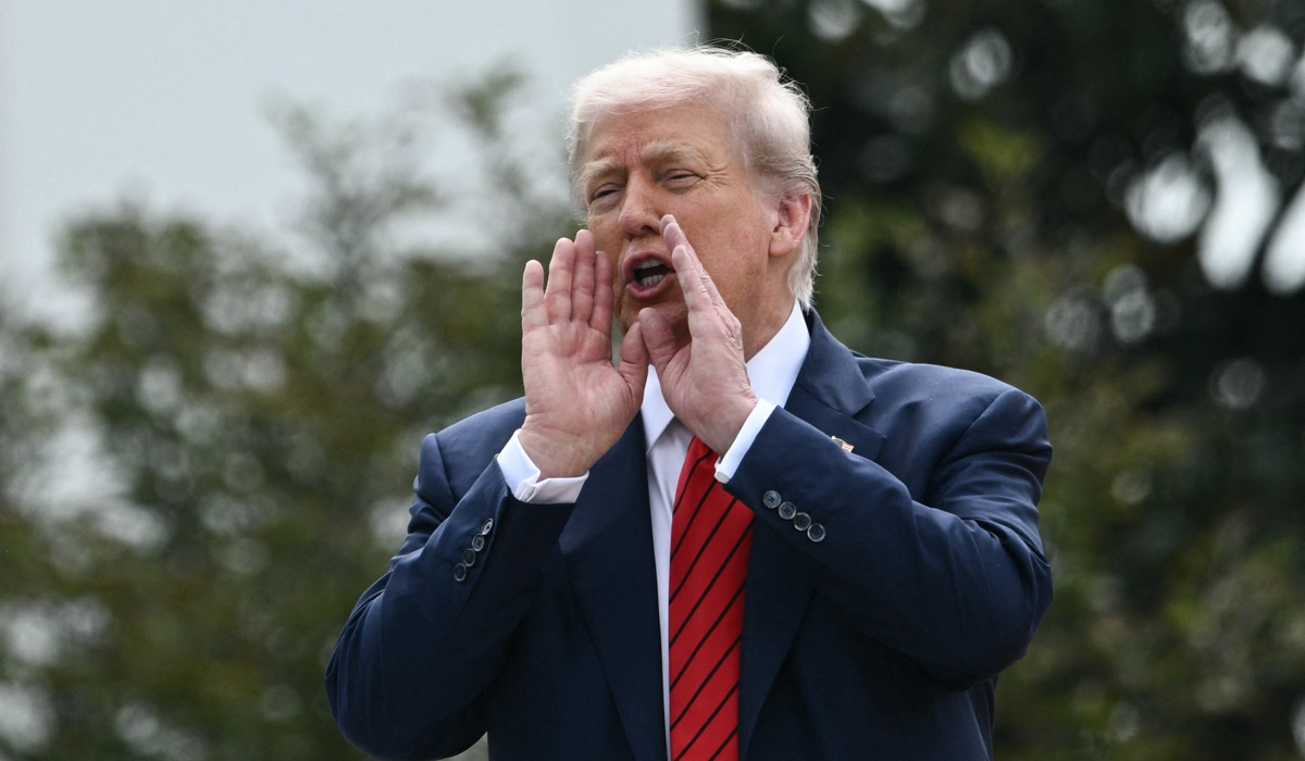 US President Donald Trump speaks to the press from a rooftop as he surveys the grounds of the White House in Washington, DC, on August 5, 2025. (AFP)