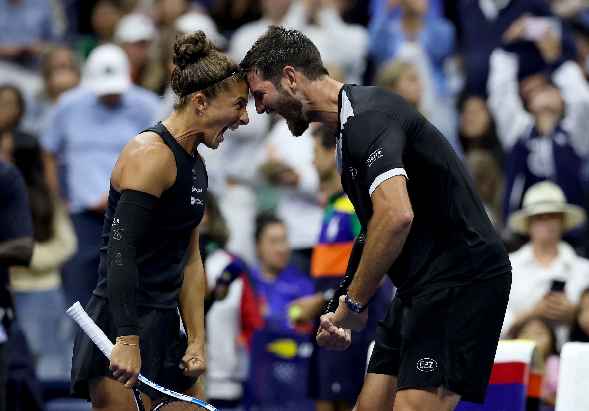 Sara Errani and Andrea Vavassori of Italy celebrate after defeating Danielle Collins and Christian Harrison of the US 4-2,4-2 during mixed doubles semifinal of the US Open at USTA Billie Jean King National Tennis Center on Wednesday in New York City. (Getty Images via AFP)