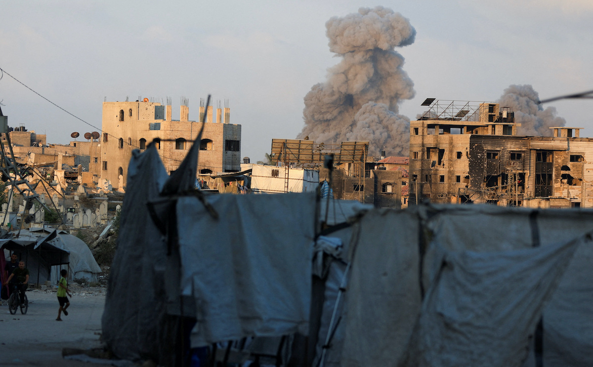 Smoke rises from an Israeli strike in Gaza City on Thursday as fart of a new military campaign on the devastated territory. (Reuters)