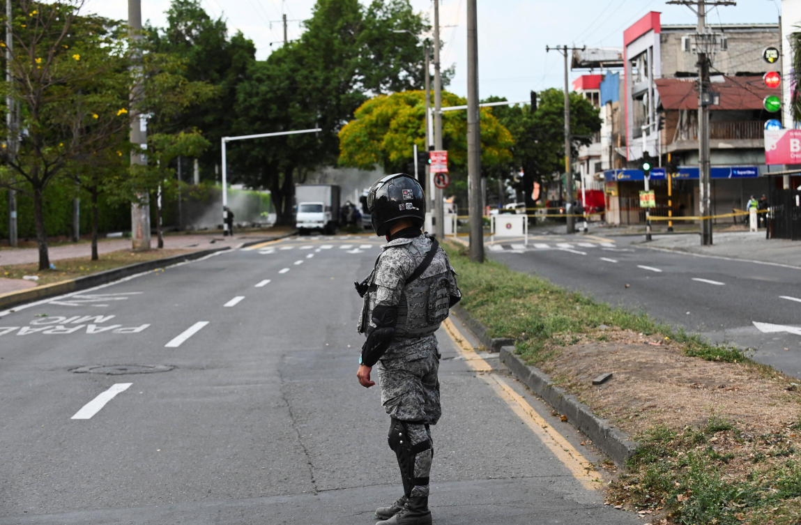 A soldier stands guard following the explosion of a cargo vehicle near an Aerospace Force base, in one of two attacks attributed to FARC dissident groups, that caused multiple casualties, according to authorities, in Cali, Colombia August 21, 2025. (REUTERS)