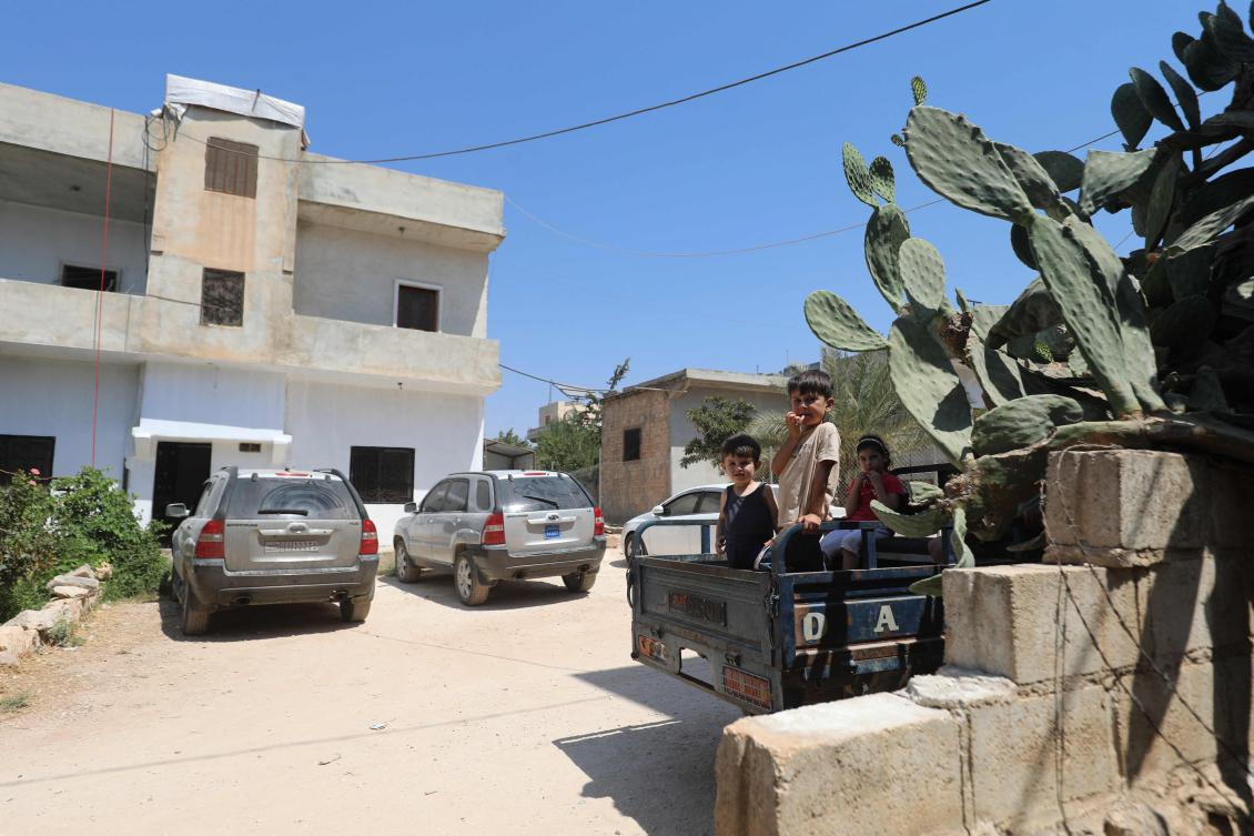 The site of a reported operation aganst Daesh by the US-led coalition, in the town of Atme in northwestern Syria on Wednesday. Extremists from the group killed a police officer in a suicide attack in the country's east on Friday. (AFP)