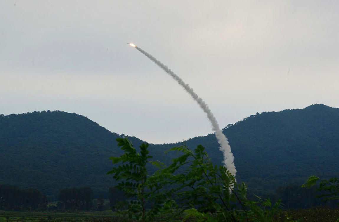 Above, North Korea test-fires a new anti-air missile at undisclosed location on Aug. 23, 2025. (Korean Central News Agency/Korea News Service via AP)