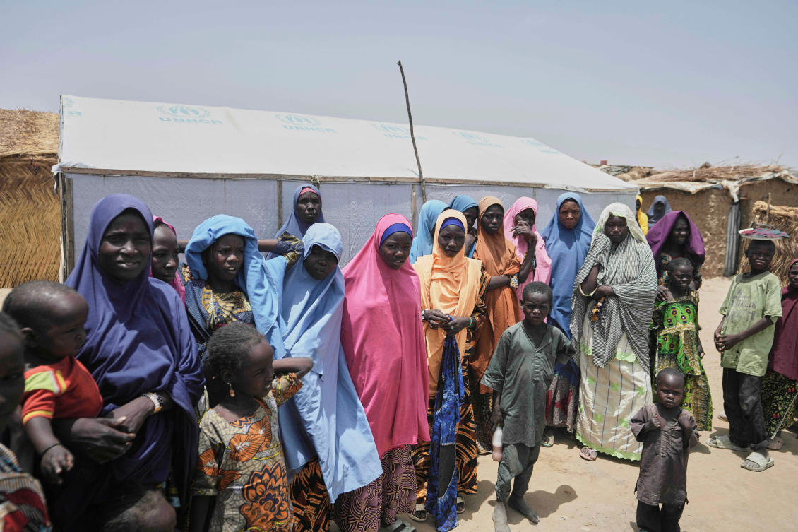 Women and children displaced by militants attacks are seen outside their camp in Dikwa, northeast Nigeria on April 29, 2025. (AP file photo)