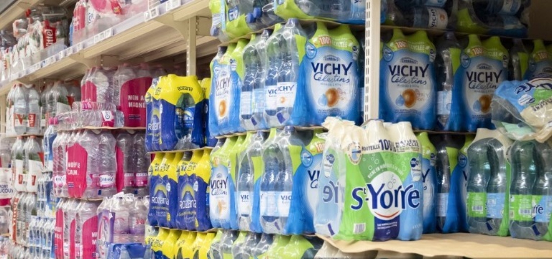 Close up of plastic bottled mineral water packs in a supermarket in France. (AFP)