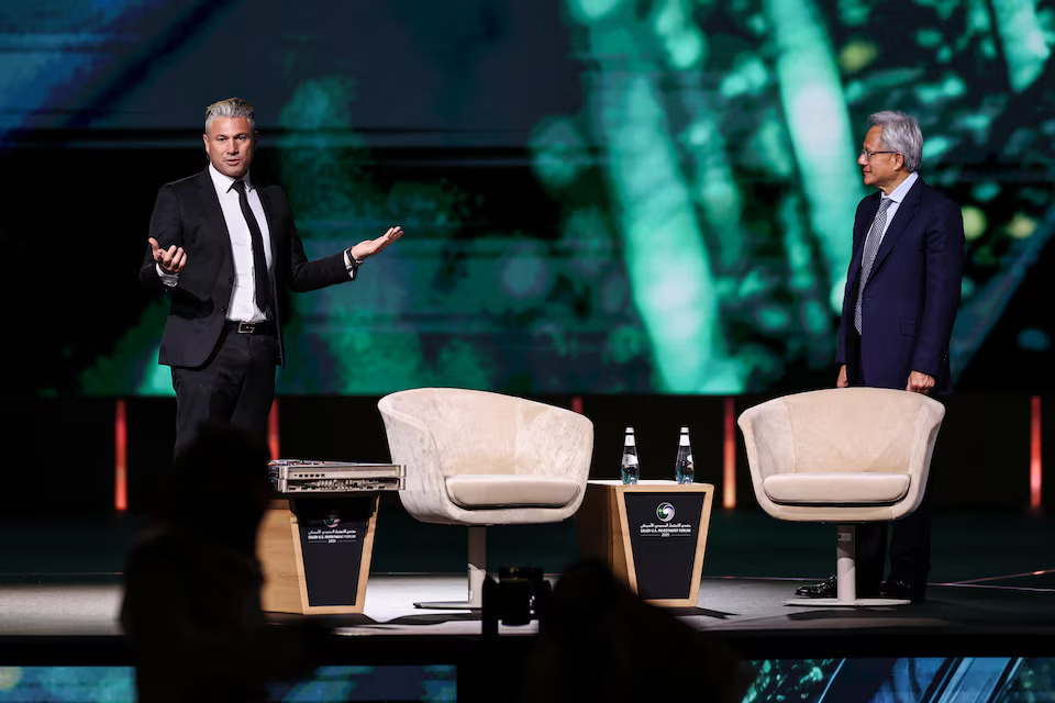 Tareq Amin, CEO of Humain, and Jensen Huang, CEO of NVIDIA, attend the Saudi-US Investment Forum in Riyadh, Saudi Arabia May 13, 2025. Reuters
