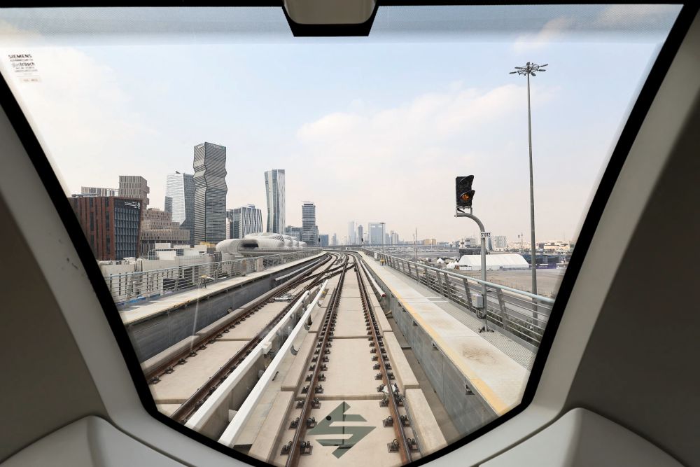 A view from inside a Riyadh Metro green line train as it approaches King Abdullah Financial District Station in Riyadh, Saudi Arabia, Jan. 28, 2025. (Reuters)