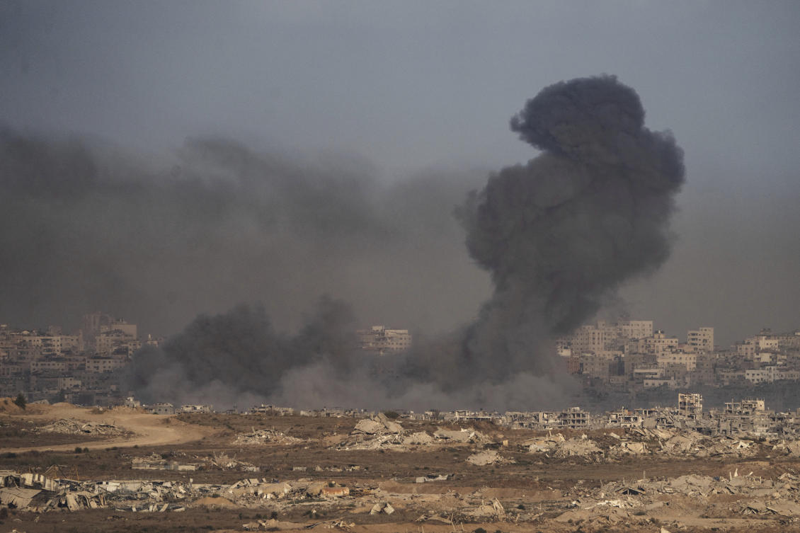 Smoke rises following an Israeli military strike in the Gaza Strip as seen from southern Israel on Thursday. (AP)