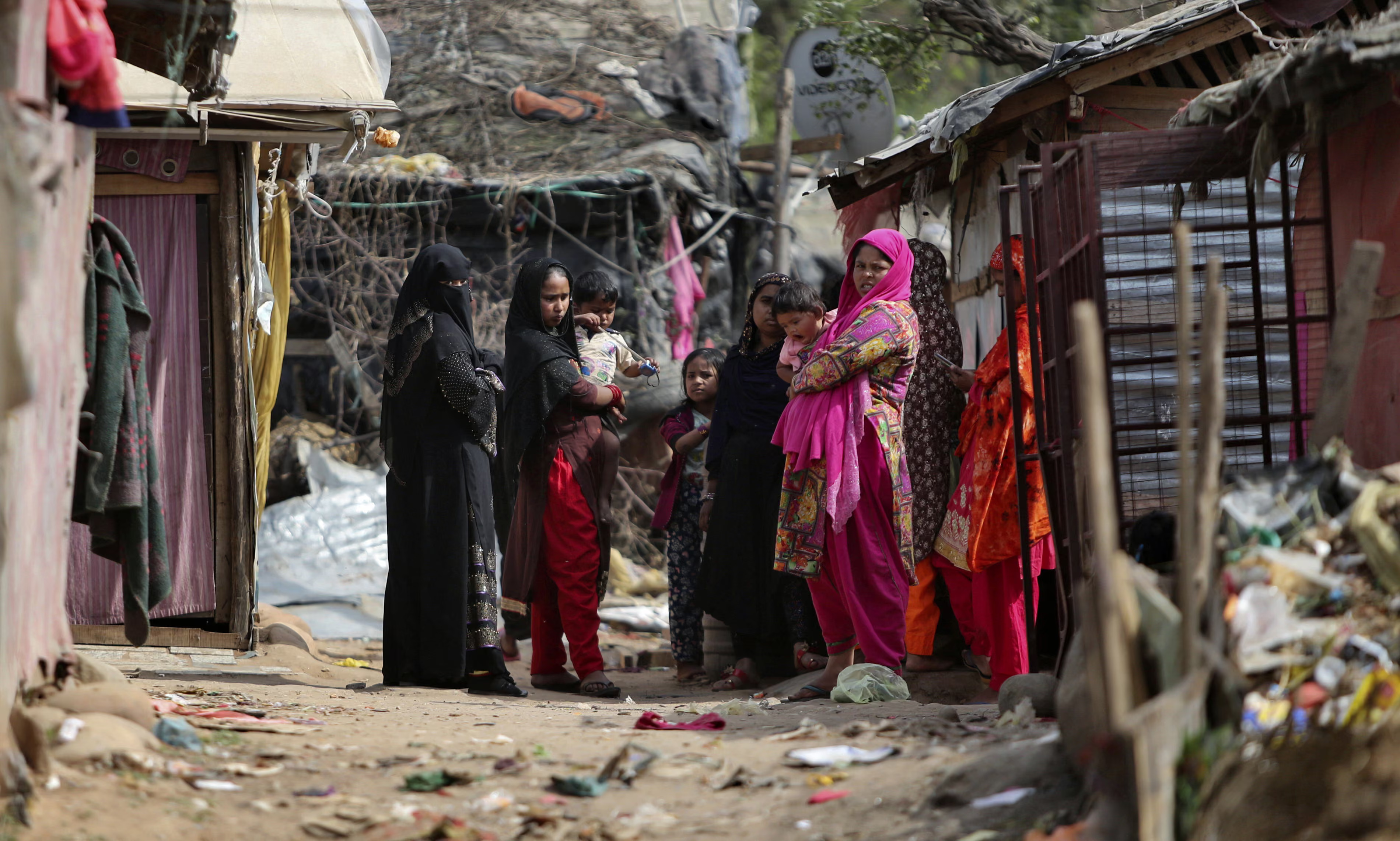 Rohingya refugees stand at a makeshift camp on the outskirts of Jammu, India in 2021. (AP)