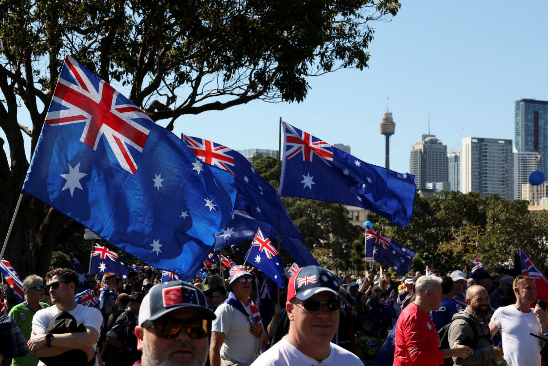 Demonstrators carry Australian flags during the ‘March for Australia’ anti-immigration rally in Sydney on Aug. 31, 2025. (Reuters)
